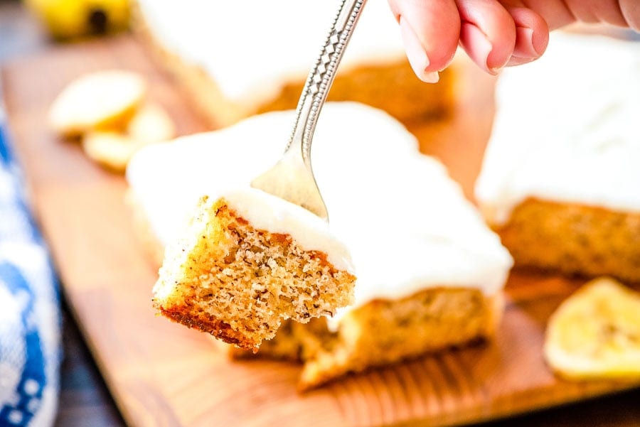 A fork with a bite of banana bar on it