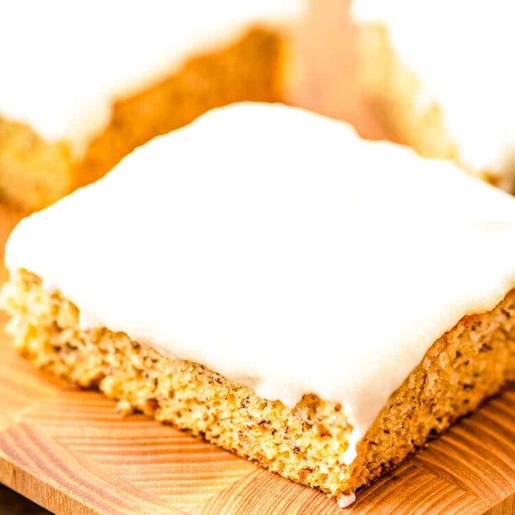Frosted Banana Bars on cutting board
