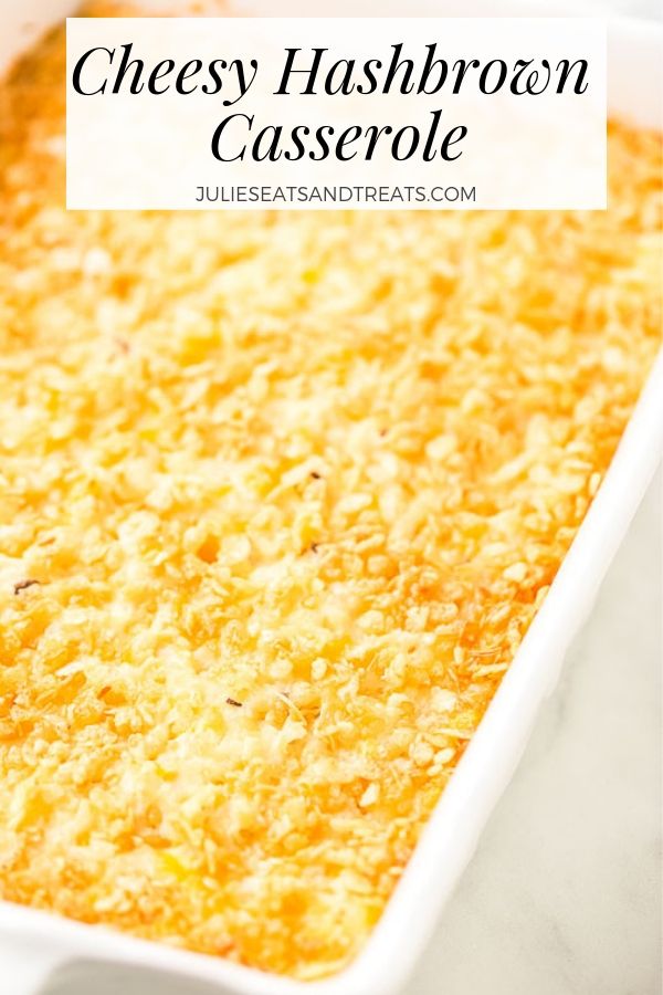 Cheesy hashbrown casserole in a white baking dish
