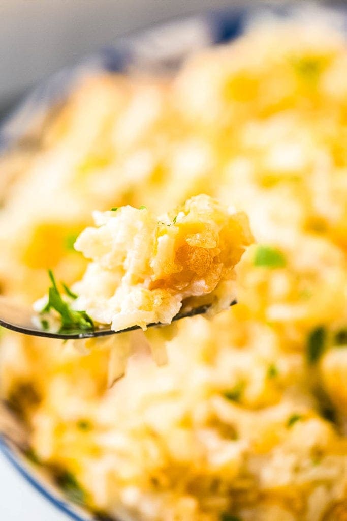 Cheesy Hashbrown Casserole on fork.