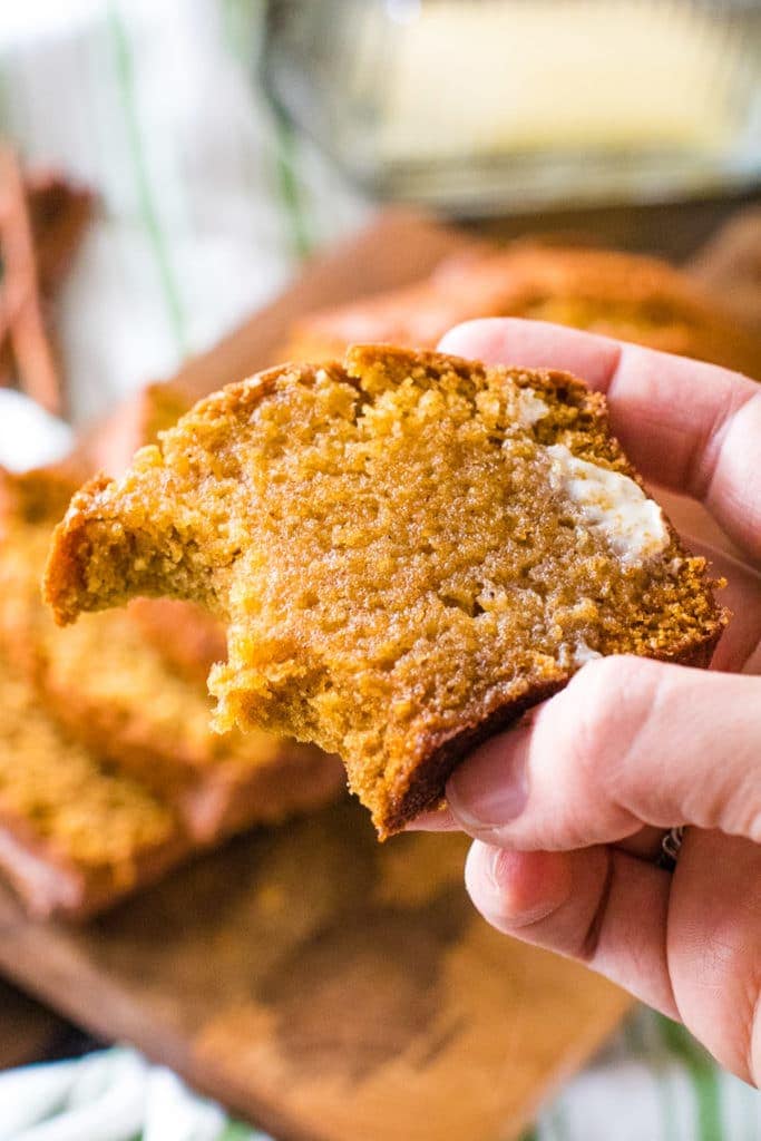 Slice of pumpkin bread in hand