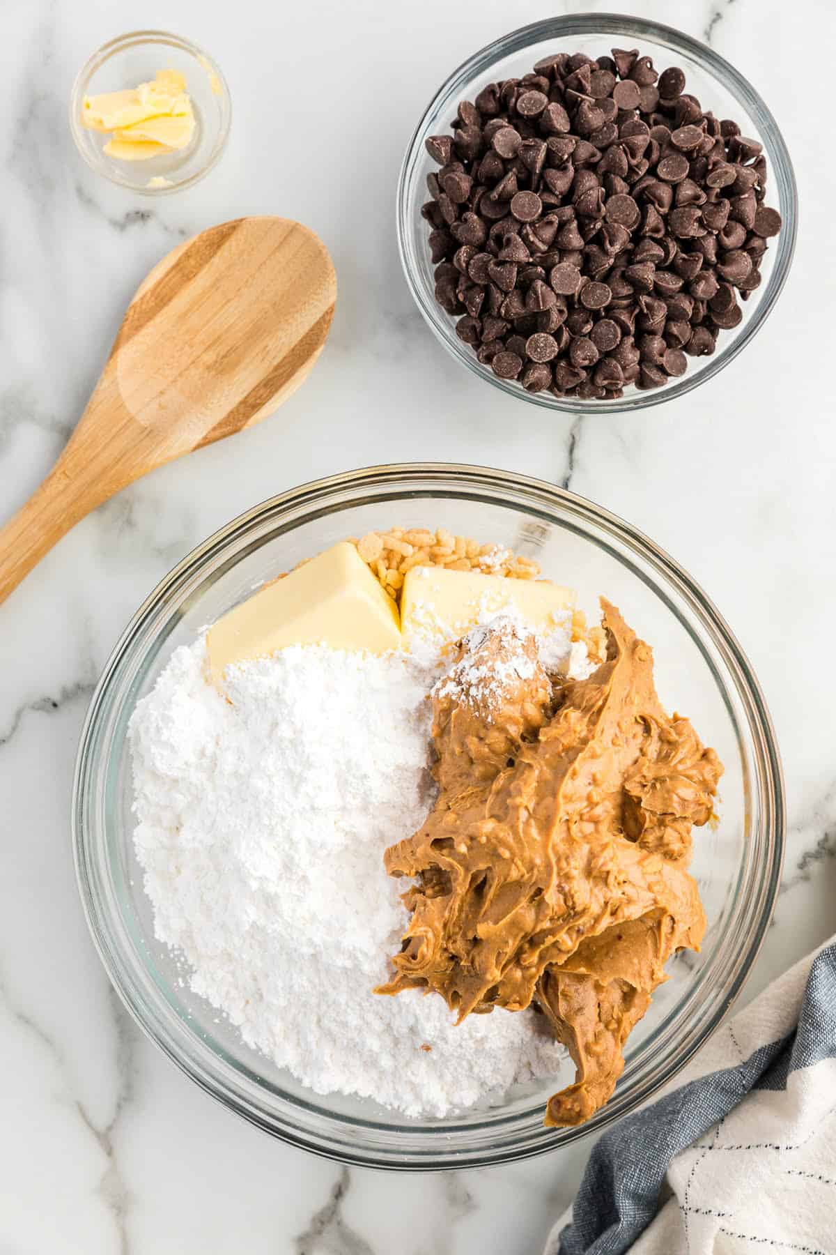 Glass bowl with ingredients for peanut butter balls center part