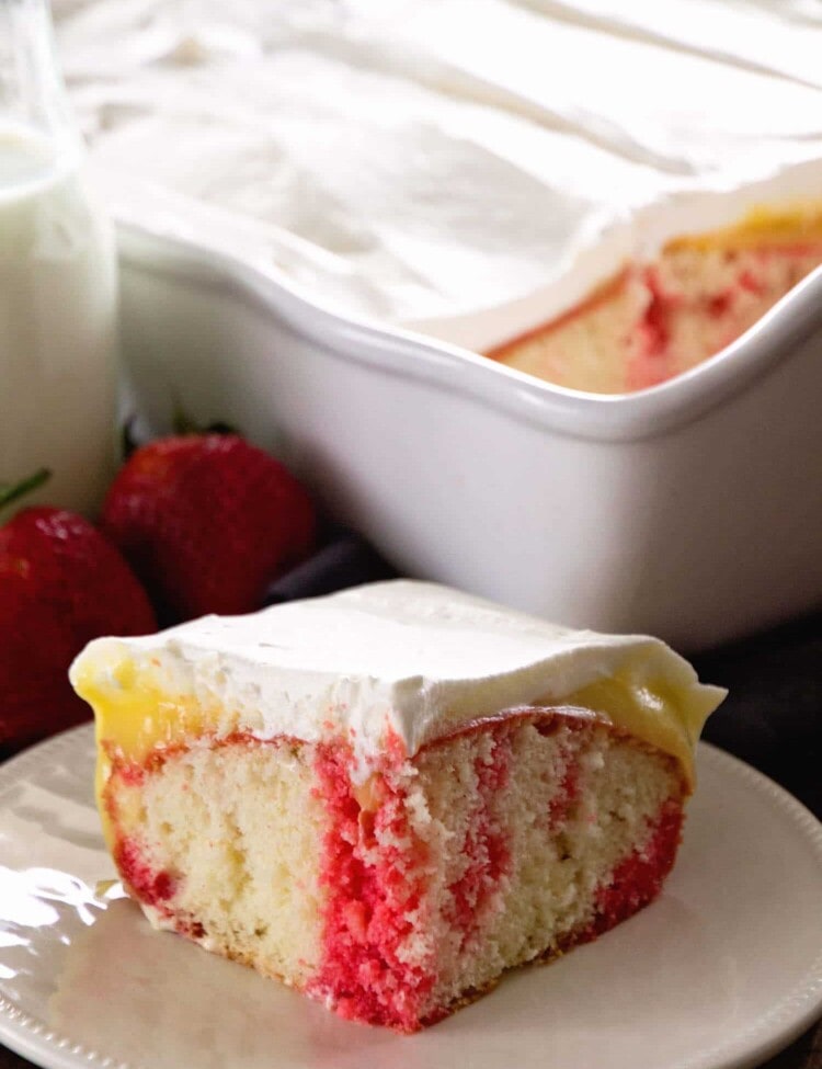 Strawberry Vanilla Poke Cake ~ Quick & Easy, But Impressive for Guests! This Light Cake Starts with a Box Mix and is Topped with Strawberry Jell-O, Vanilla Pudding and Cool Whip! Perfect Comfort Food Dessert!