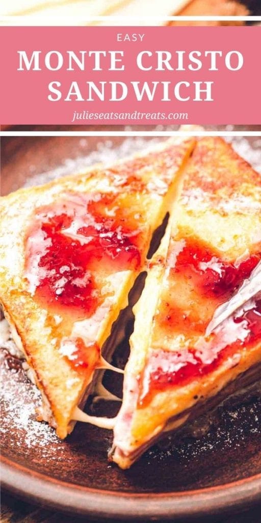 Monte cristo sandwich cut in half diagonally and dusted with powdered sugar