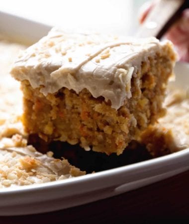 Gooey Cinnamon Carrot Poke Cake ~ Amazingly Moist Cake Stuffed with Carrots, Coconut, Pineapple, Topped with a Buttermilk Glaze and Cinnamon Cream Cheese Frosting!