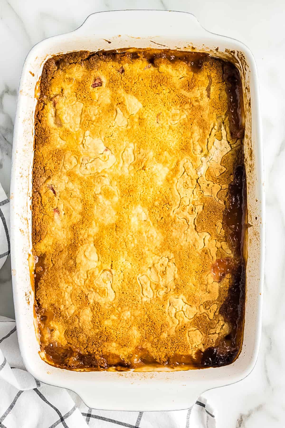 Overhead image of baked rhubarb dump cake