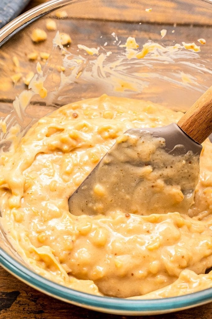 Cream cheese dip mixed together and brickle pieces stirred in.