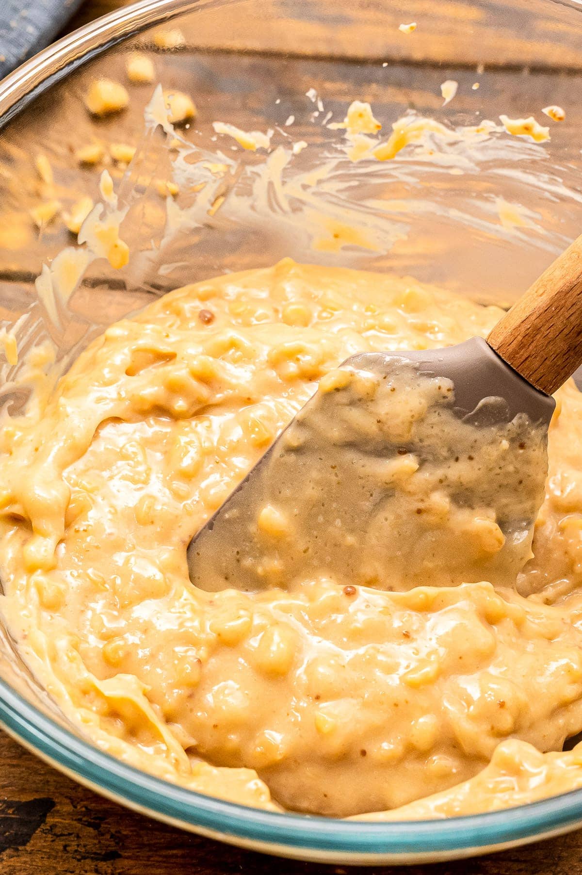 Cream cheese dip mixed together and brickle pieces stirred in.