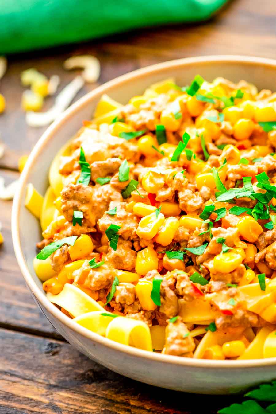 Easy Taco Stroganoff over pasta in a bowl