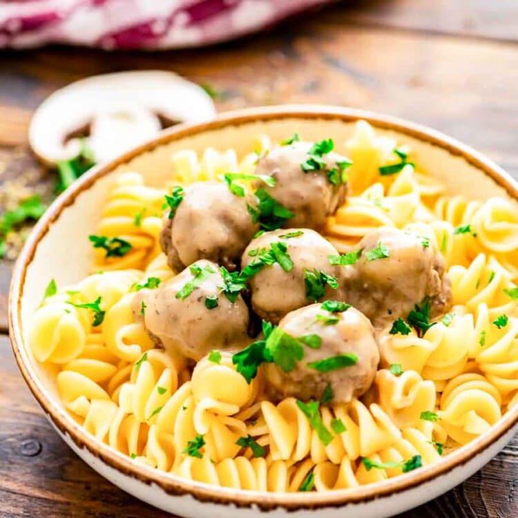 Bowl of Crockpot Swedish Meatballs and egg noodles