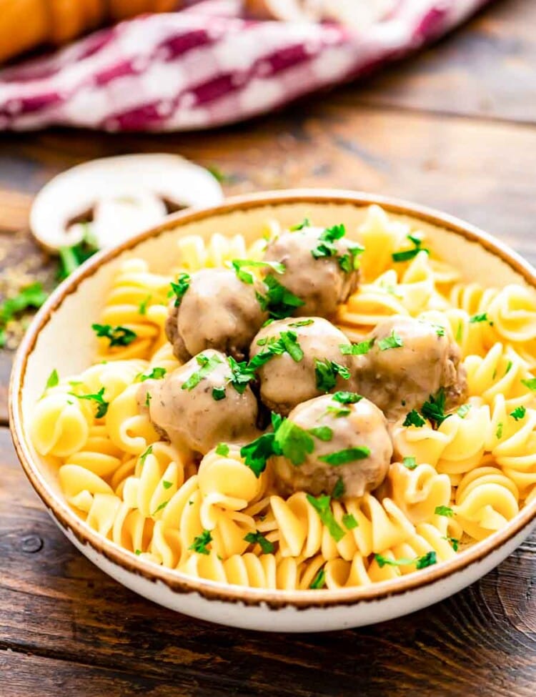 Bowl of Crockpot Swedish Meatballs and egg noodles