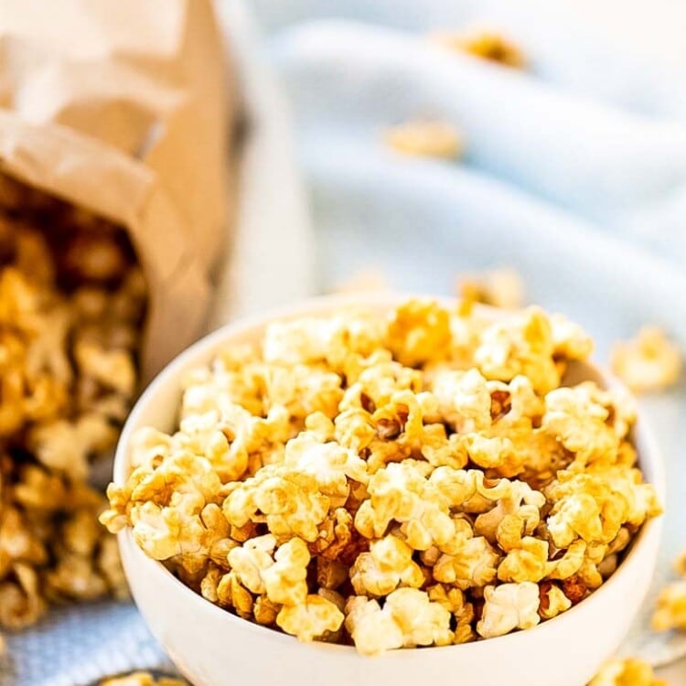 Caramel Corn in bowl with bag in background