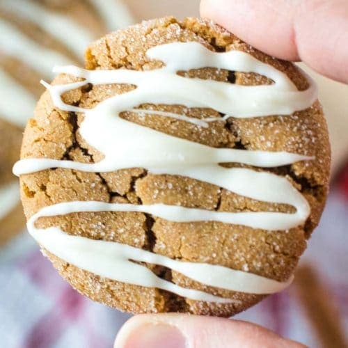 White Chocolate Molasses Cookies held by hand