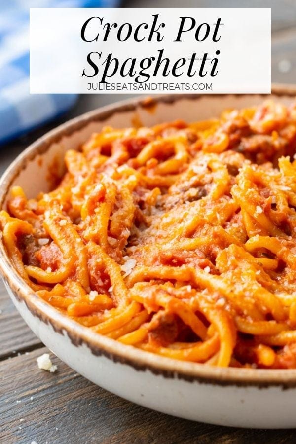 Crock pot spaghetti in a cream and brown bowl