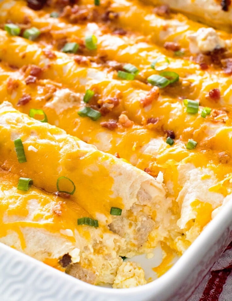 Overhead image of Overnight Breakfast Enchiladas in a white baking dish