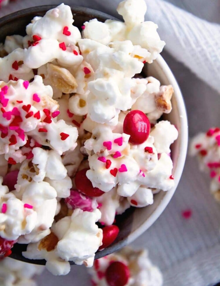 Valentine's Day Snack Mix ~ Popcorn, Peanuts and M&M's coated in White Almond Bark! An Easy Sweet Snack for Your Sweetie!