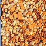 Sheet pan with chex mix on it