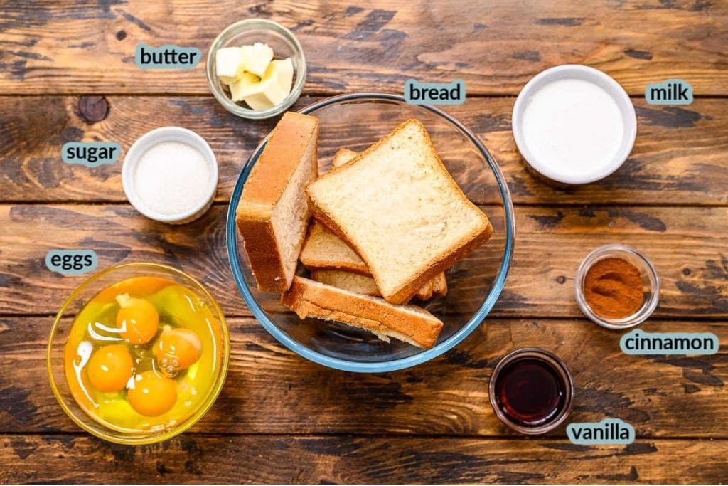 Image of ingredients including eggs bread milk sugar cinnamon vanilla and butter