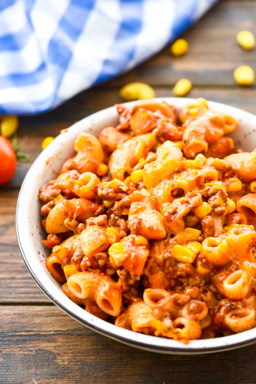 Bowl of one pot taco pasta on wooden background