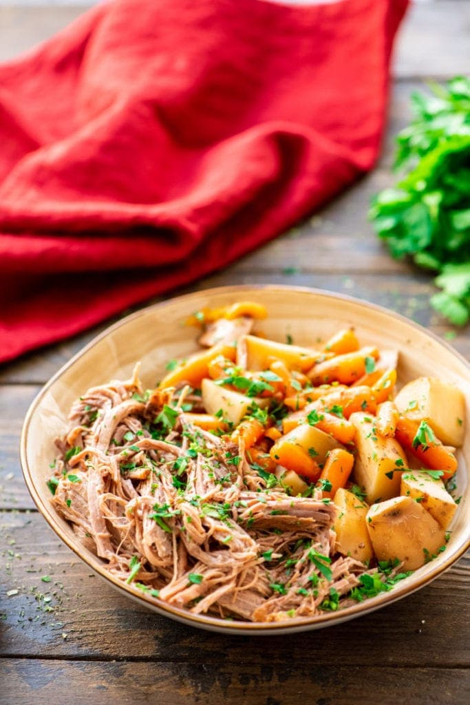 Slow Cooker Beef Roast with vegetables in bowl