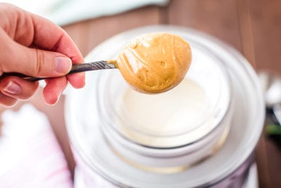 Peanut butter being added to Nutter Butter Ice Cream