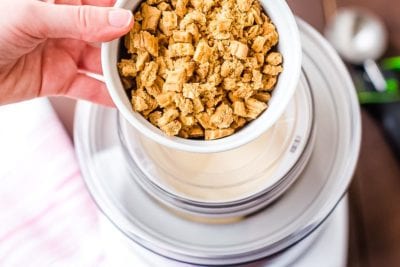 cookies being added to Nutter Butter Ice Cream