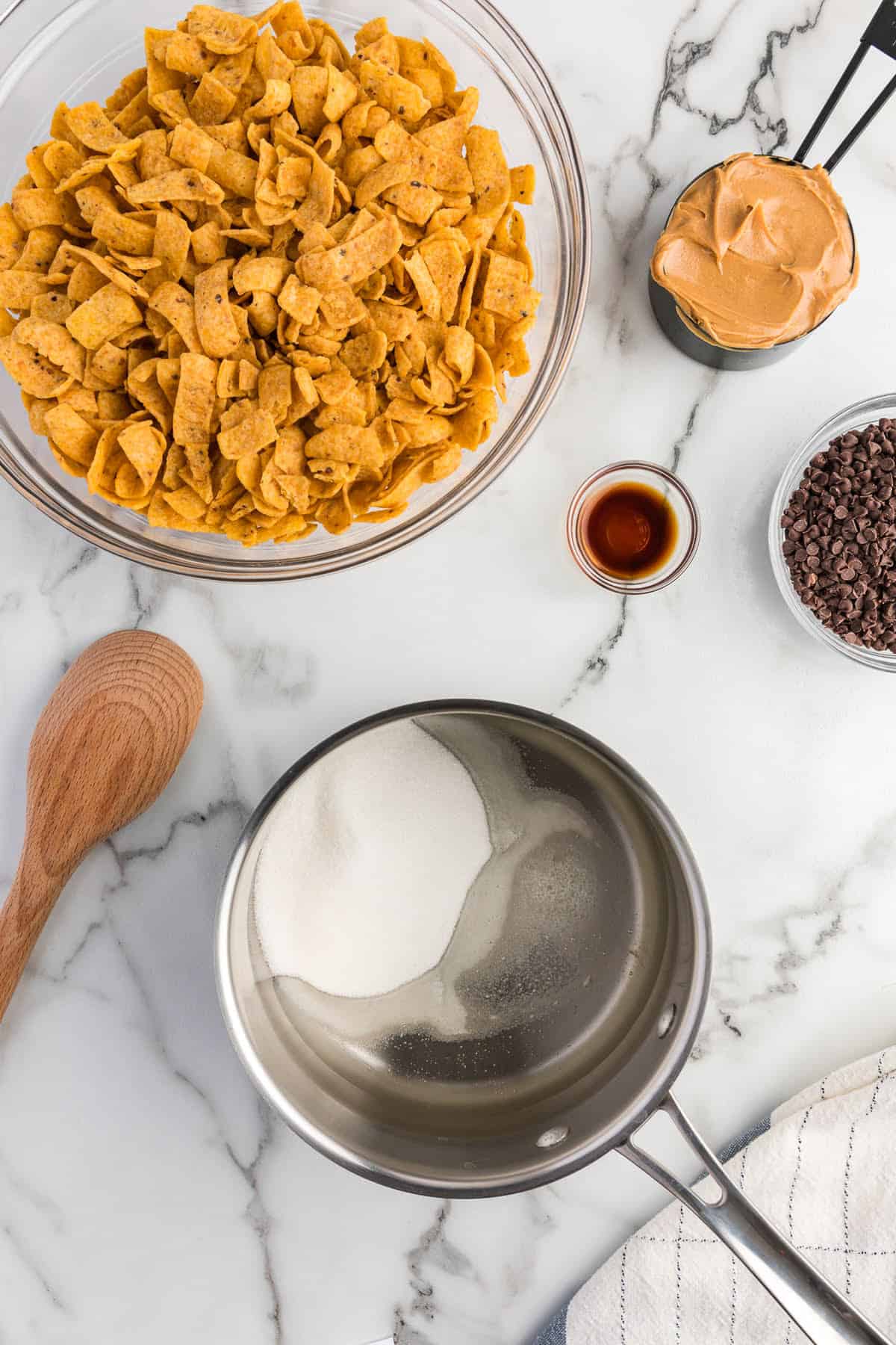 White sugar and corn syrup in saucepan