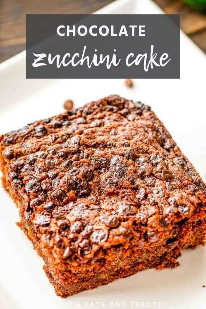 Piece of chocolate zucchini cake on a white plate