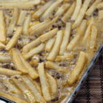 French fry hot dish in a shallow baking dish