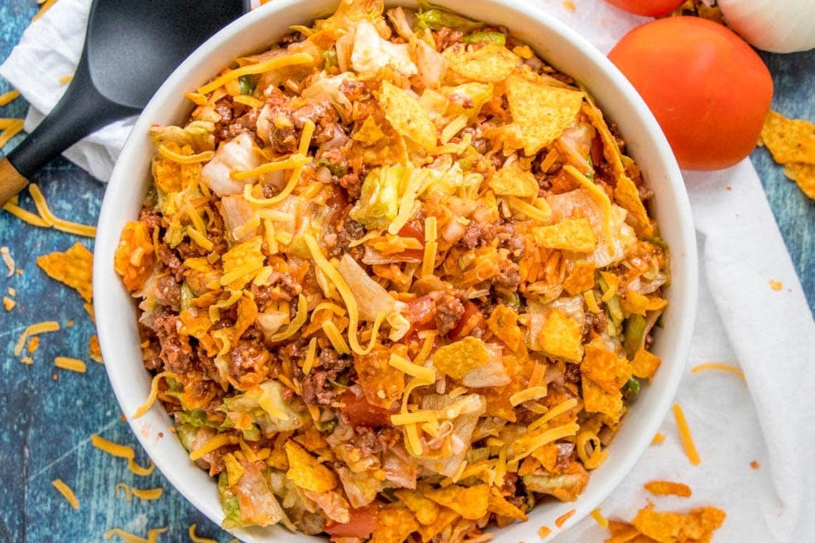 Taco salad in a white serving bowl