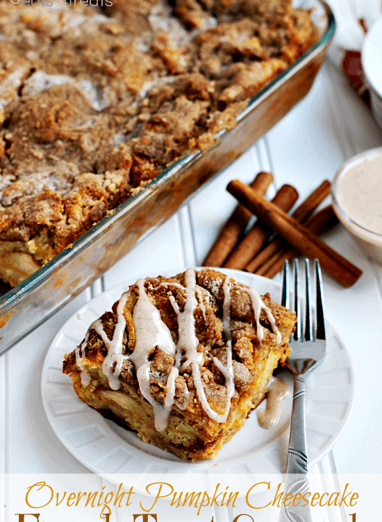 Piece of overnight pumpkin cheesecake and a fork on a white plate in front of a glass dish of the rest of the casserole