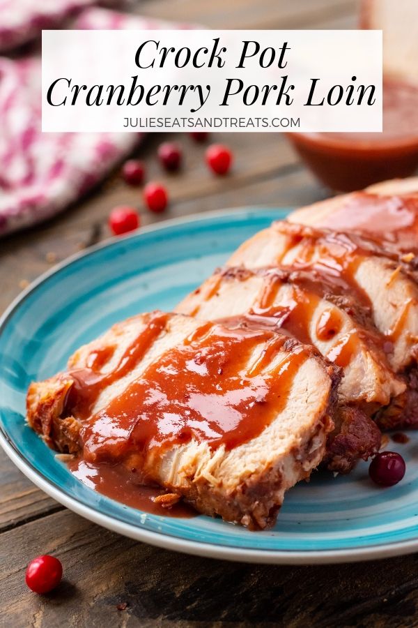 Crock Pot Pork Loin with cranberry sauce on blue plate