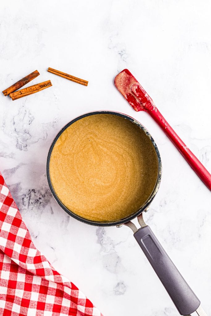 Saucepan with prepared caramel sauce