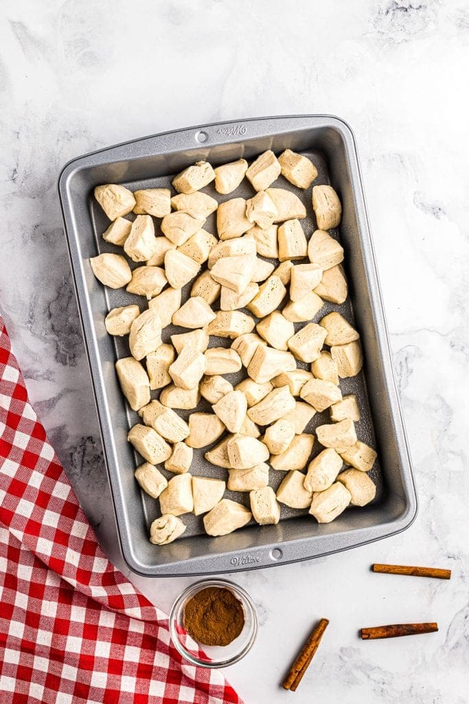 Biscuit pieces in cake pan