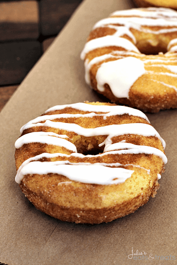 Drizzled Snickerdoodle Donuts ~ Light, Fluffy Donuts Rolled in Cinnamon Sugar and Topped with a Vanilla Drizzle!