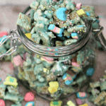 Open glass jar of lucky leprechaun munch snack mix