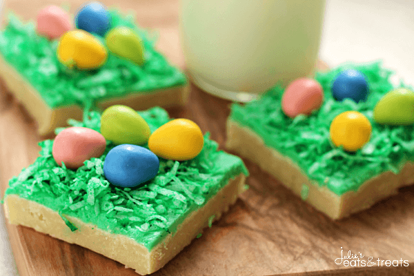 Easter Egg Hunt Sugar Cookie Bars ~ Soft, Chewy Sugar Cookie Bars topped with Green Coconut “Grass” and Candy Easter Eggs!