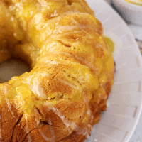 Lemon Monkey Bread ~ Flaky Biscuits Stuffed with Lemon Pie Filling and Drizzled in a Lemon Glaze