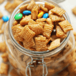 Glass jar of sweet and salty cashew snack mix