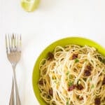 Lemon Garlic Spaghetti with Sundried Tomatoes is an easy side or main dish to prepare for your entire family, loaded with fresh and juicy flavors and textures thanks to the citruses, tomatoes, herbs and pine nuts.