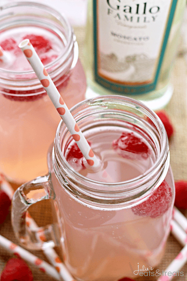Pink Moscato Lemonade ~ Pink Lemonade spiked with Moscato, Loaded with Raspberries and Bubbly!