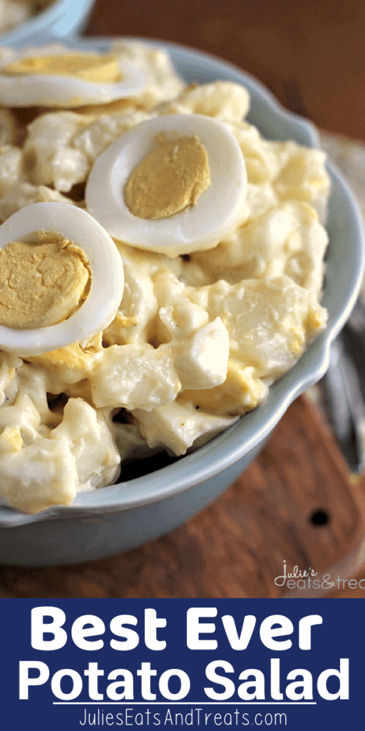 Potato Salad in a grey bowl with hard boiled egg slices on top