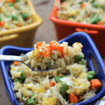 Three colorful bowls of easy chicken fried rice