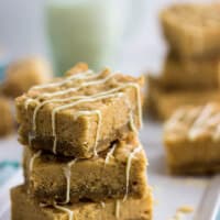 These quick and easy sugar cookie bars are topped with white chocolate almond Rice Krispie treats! Great for kids, and always the first to go at parties!