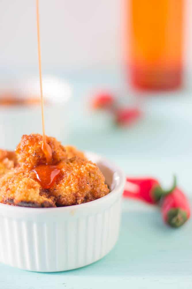 Cauliflower Bites in Honey Sriracha Sauce make a delicious and filling vegetarian meal that is a delicious balance of sweet and spicy! #vegetarian
