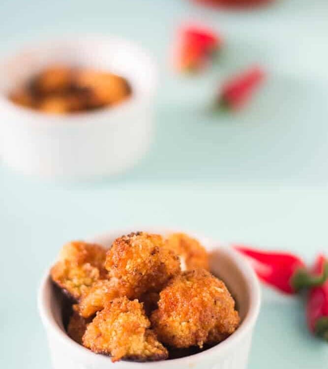 Cauliflower Bites in Honey Sriracha Sauce make a delicious and filling vegetarian meal that is a delicious balance of sweet and spicy!