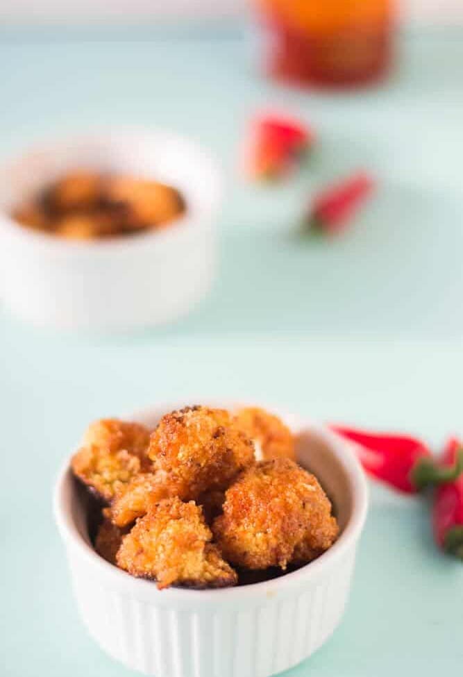 Cauliflower Bites in Honey Sriracha Sauce make a delicious and filling vegetarian meal that is a delicious balance of sweet and spicy!