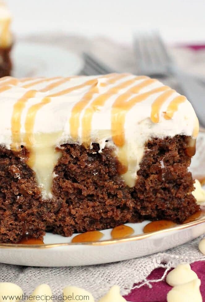 White Chocolate Gingerbread Poke Cake ~ Delicious, Moist Gingerbread Cake Layered with White Chocolate Pudding and Cool Whip!
