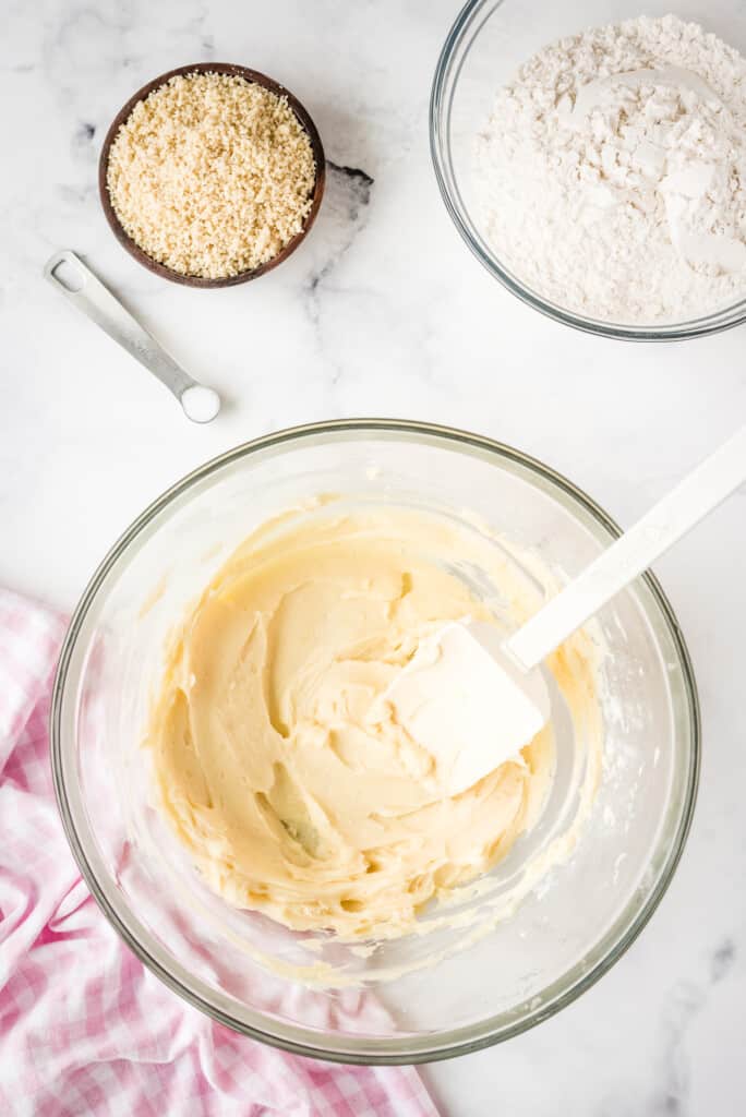 Mixing bowl with creamed butter, vanilla, and powdered sugar