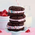 Double Chocolate Strawberry Oreos: super easy cake mix cookies filled with strawberry chocolate ganache and strawberry frosting. Perfect for Valentine's Day!